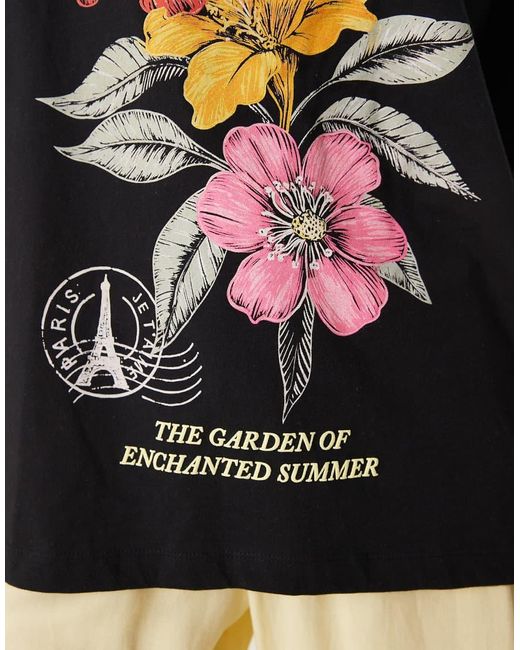 Camiseta Negra Extragrande Con Estampado Gráfico Floral "Le Jardin" De ASOS de color Black