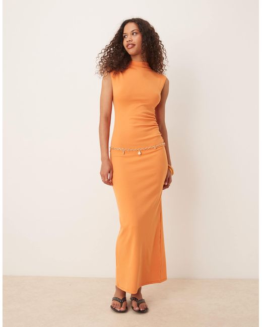 Robe longue ajustée en modal mélangé doux à col montant Mango en coloris Orange