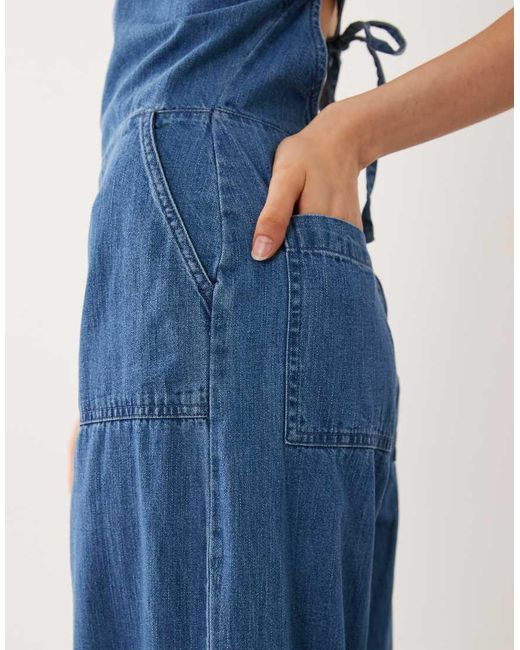 ASOS Blue Halter Neck Denim Jumpsuit With Patch Pockets