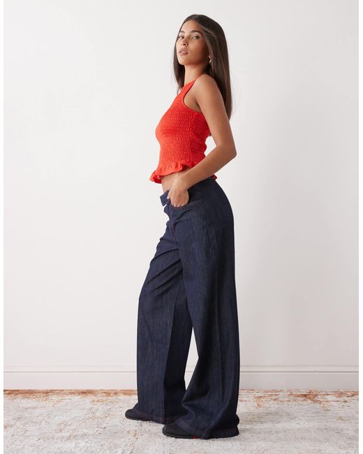 Jean ample en chambray - brut délavé Collusion en coloris Blue