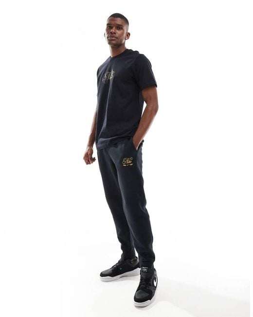 Nike Black Club Festive joggers for men