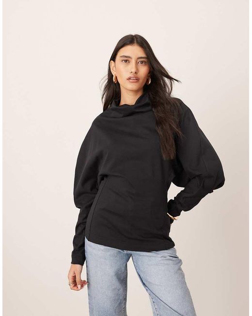 ARRANGE Black Sculptural Jersey Longline Top