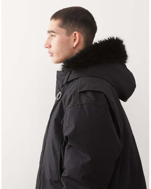 Parka Negra Extragrande Con Capucha De Piel Sintética De Weekday de hombre de color Black