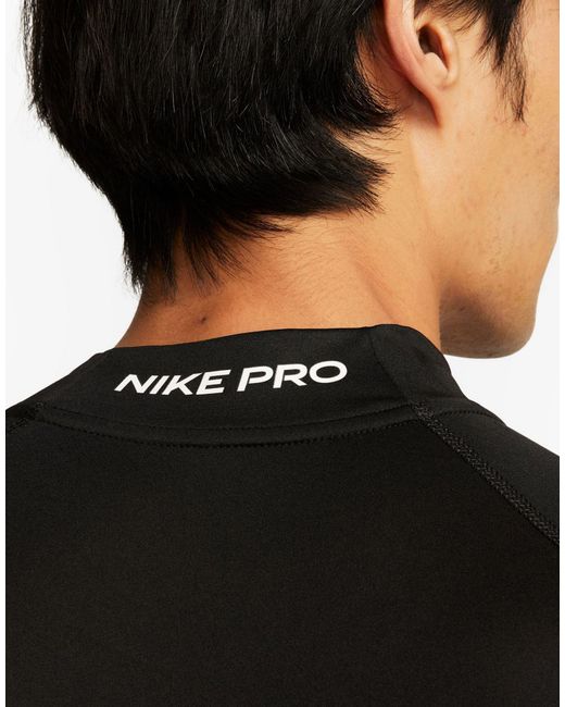 Dri-fit - top a maniche lunghe nero di Nike in Black da Uomo