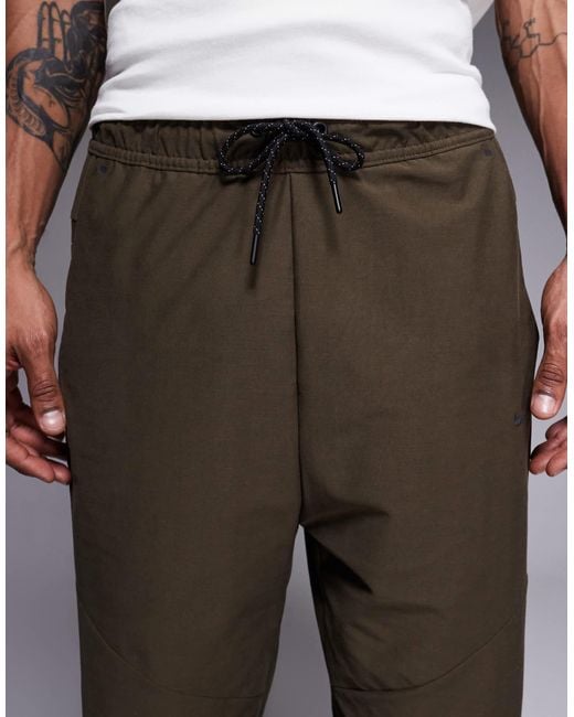 Nike Gray Solo Swoosh Cuffed Sweatpants for men