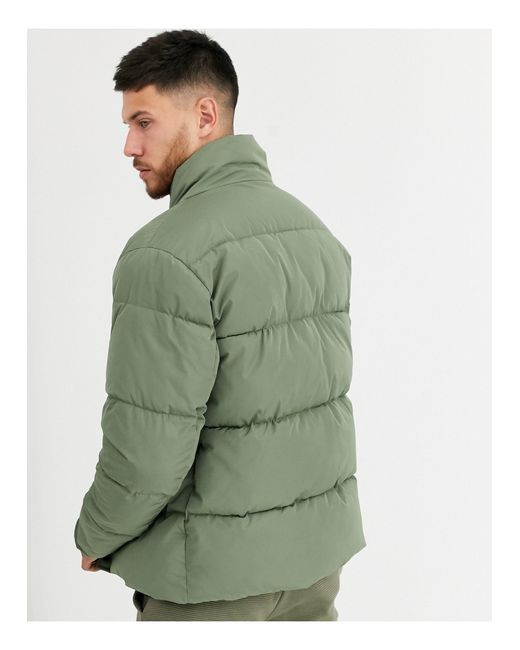 asos design sustainable puffer jacket in black with funnel neck