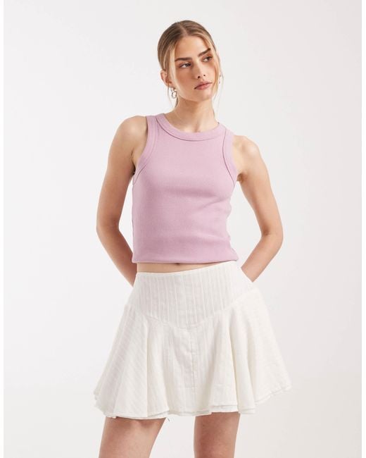 Mini-jupe texturée à taille basse ASOS en coloris Pink