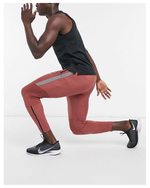 Pantalon de running Phenom Elite Wild Run pour Nike pour homme en coloris Red