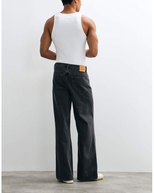 Calvin Klein Black Essential Relaxed Wide Leg Jeans for men