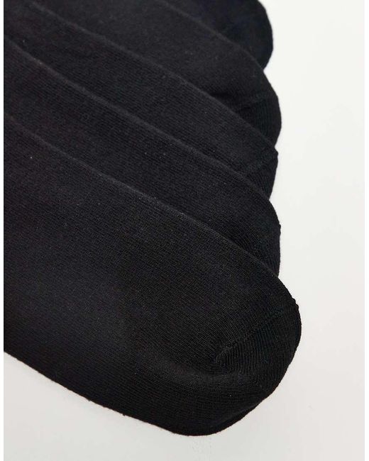 Pack De 5 Pares De Calcetines Negros Para Zapatillas De Deporte Con Lazo En La Parte Trasera De ASOS de color Black