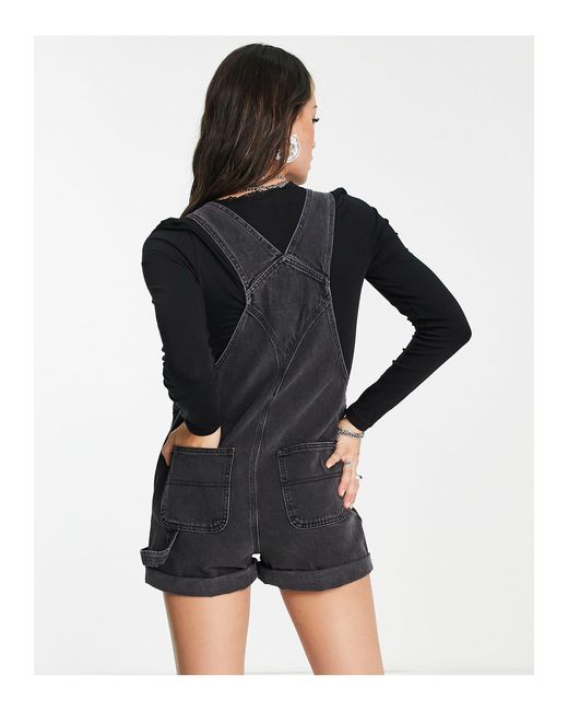 Inspired - salopette di jeans corta slavatoReclaimed (vintage) in Denim di  colore Nero | Lyst