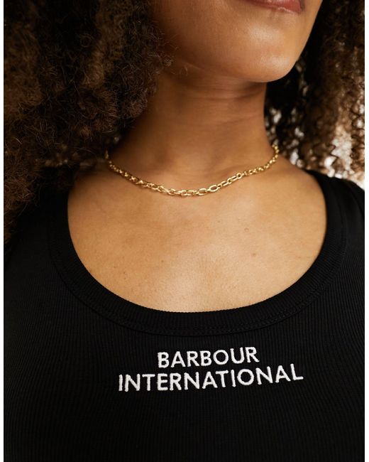 International - top senza maniche a coste con logo di Barbour in Black