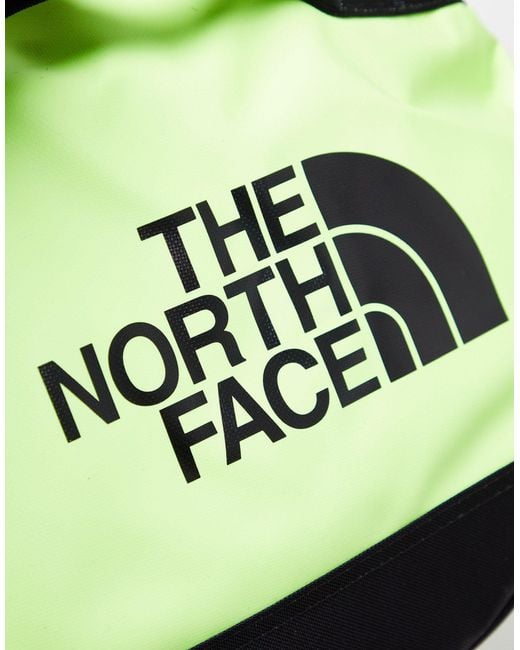 Base camp - borsone color safety/nero tnf di The North Face in Green