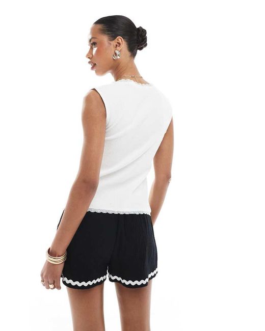 Pieces White Lace Trim Ribbed Sleeveless Top With Button Front Detail