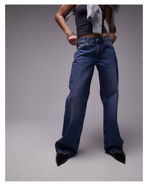 Ember - jeans a fondo ampio e vita bassa medio di TOPSHOP in Blue