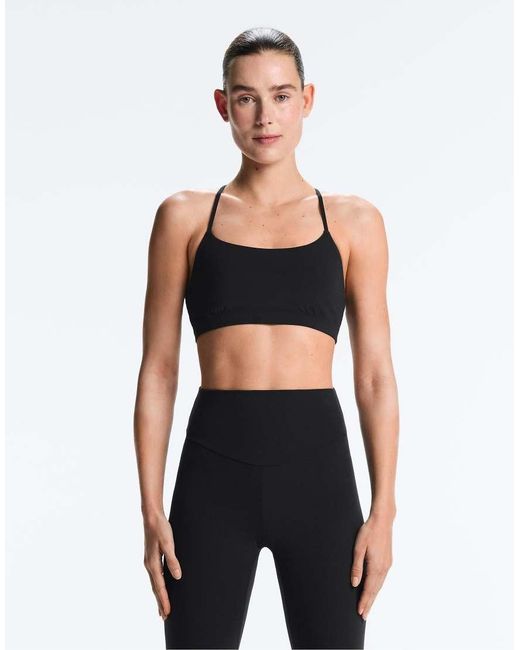 Oysho Black Comfortlux Light-support Sports Bra With Crossover Straps