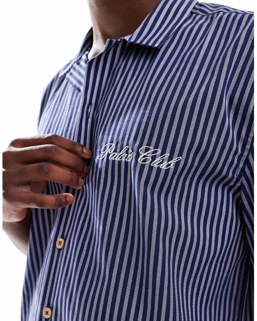 Chemise décontractée rayée avec col à revers et broderie sur la poitrine ASOS pour homme en coloris Blue