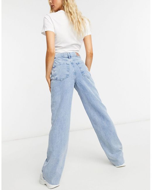 Dad jeans a vita bassa slavato di Stradivarius in Blu | Lyst