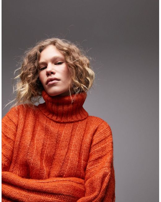 Maglione color ruggine a coste larghe con collo alto di TOPSHOP in Orange