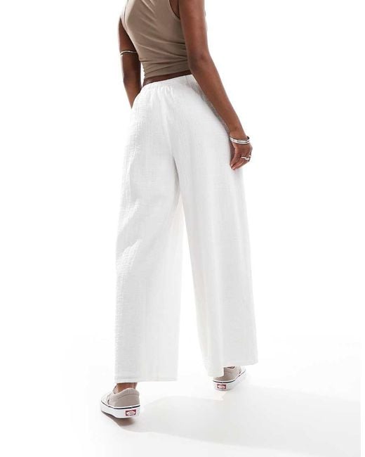 Labelrail White X Olivia Grace Herring Wide Leg Low Rise Textured Trousers