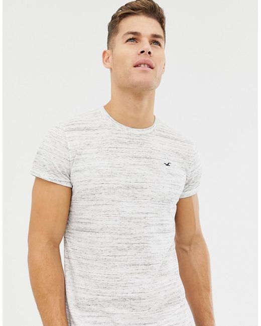 Hollister T-Shirt in weiem Kalk mit abgerundetem Saum und Logo in Weiß für  Herren | Lyst DE