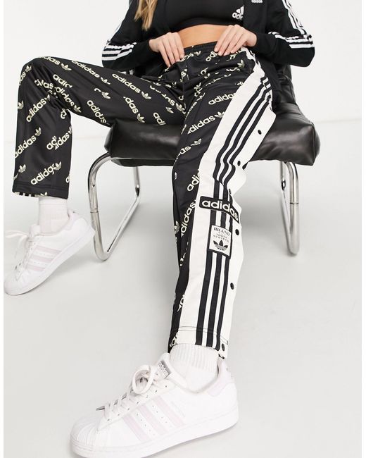 adidas Originals Logomania Repeat Logo Adibreak Side Snap Track Pants in Black - Lyst