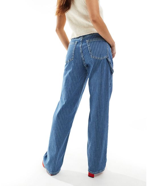 Kirsi - jeans cargo con fondo ampio a vita alta a righe bianche di ONLY in Blue