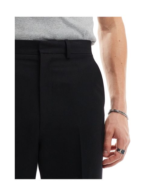 Pantaloni eleganti vintage a zampa neri con spacco laterale di ASOS in White da Uomo