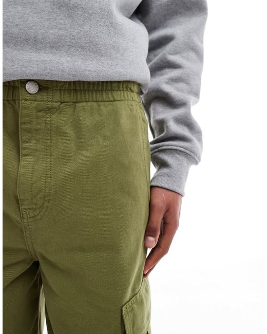 Short cargo long - kaki ASOS pour homme en coloris Green