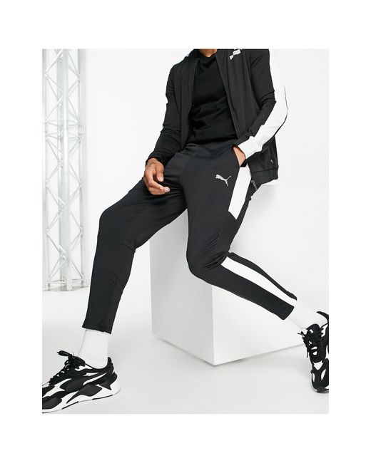 Pantalones PUMA de hombre de color Negro | Lyst