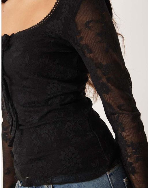 Gina Tricot Blue Long Sleeve Tie Front Flower Jacquard Top