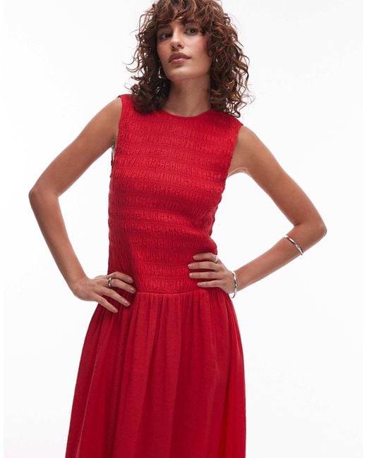 Robe mi-longue à taille basse et corsage froncé Mango en coloris Red