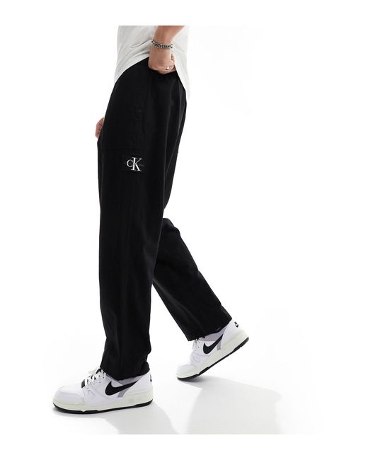 Pantalones negros Calvin Klein de hombre de color White