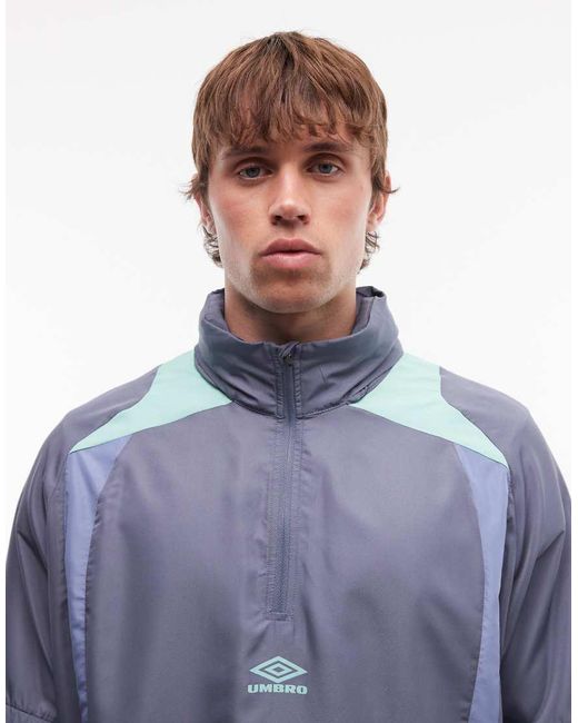 Umbro Blue Zip Off Sleeve Wind Jacket for men