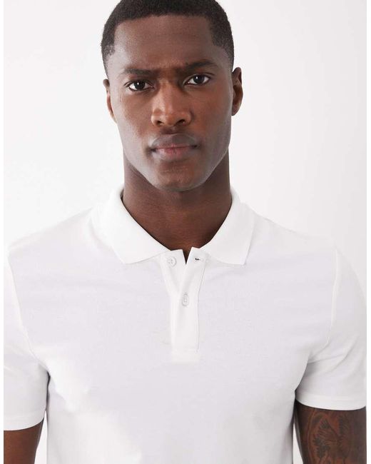 Polo Basic Attillata di ASOS in White da Uomo