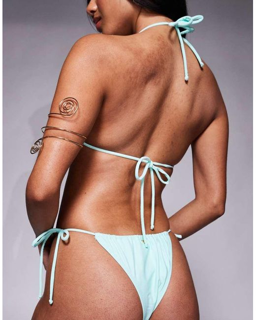Slip Bikini Color Acqua Con Allacciatura Laterale E Perline di Candypants in Blue