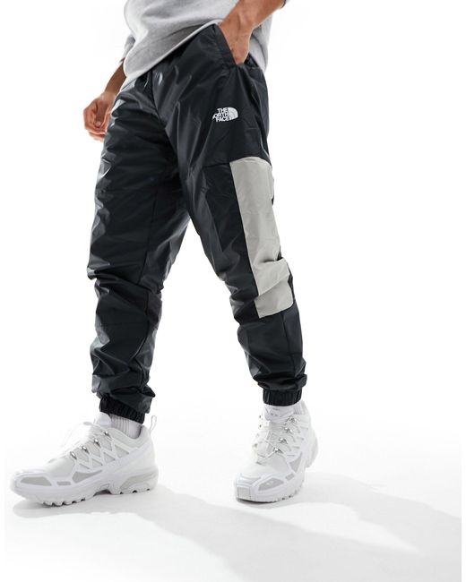 The North Face White Training Mountain Athletics Wind Track joggers for men
