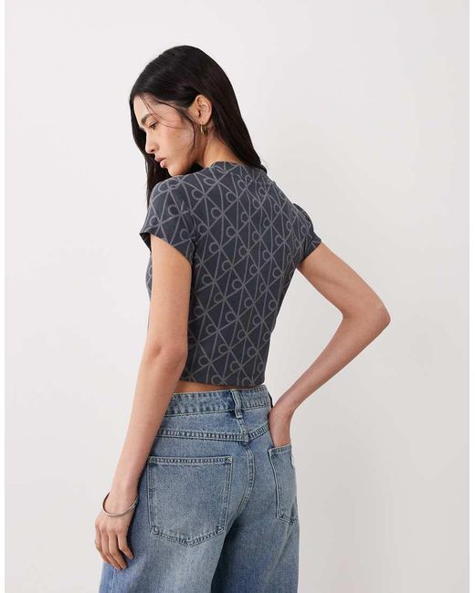 Calvin Klein Blue Embossed Logo Cropped Baby Tee
