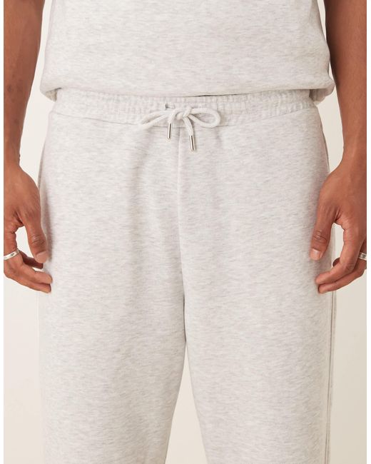 ASOS Natural Tapered Loopback joggers With Side Piping for men