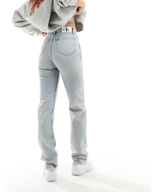 Jean droit à taille haute - clair délavé Calvin Klein en coloris Blue