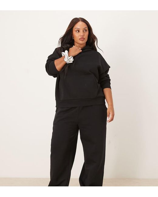 Joggers Negros De Pernera Ancha Con Interior Afelpado De Asos Design Curve ASOS de color Black