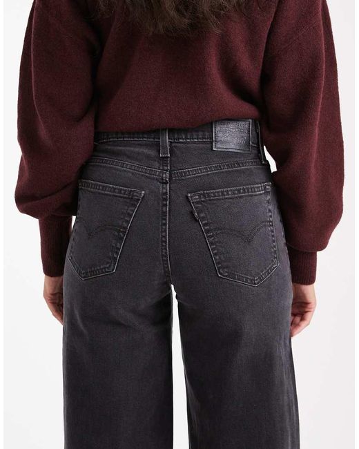 Vaqueros Negro Lavado De Talle Alto Y Pernera Ancha Elástica 728 De Levi's de color Black