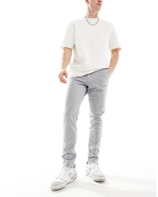 Pantalon chino slim - clair Jack & Jones pour homme en coloris White