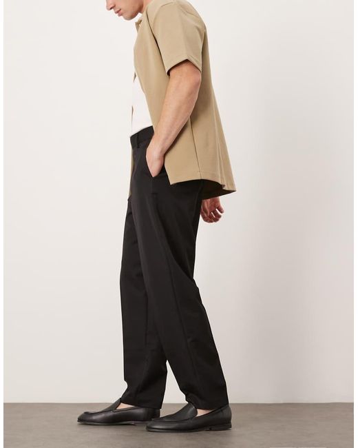 Pantalones De Vestir Negros De Corte Tapered Holgado De ASOS de hombre de color Black