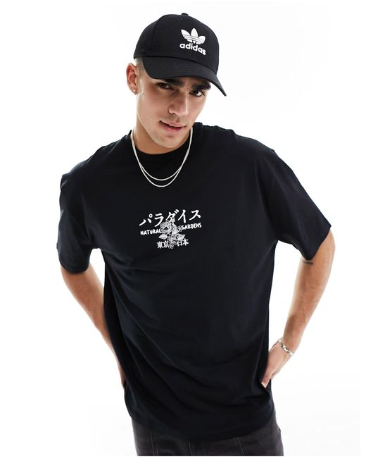 T-shirt oversize imprimé fleuri au dos et sur la poitrine ASOS pour homme en coloris Black