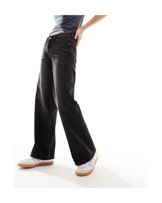 Imoo - jean ample taille basse - délavé Monki en coloris Black