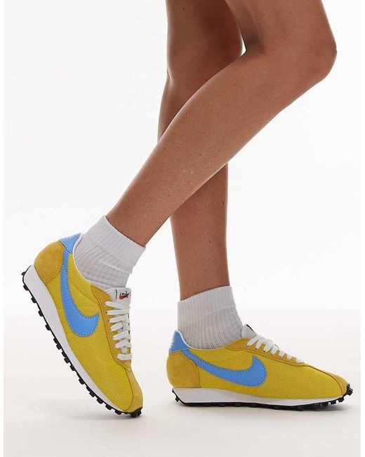nike yellow and blue trainers