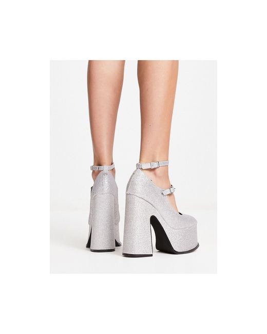 Natelle - chaussures à talon avec semelle plateforme - à paillettes Shellys London en coloris White