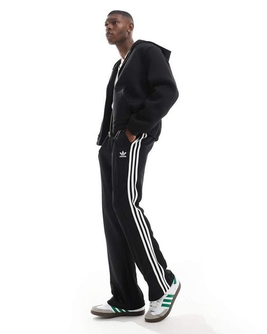 Mens flared tracksuit bottoms hotsell