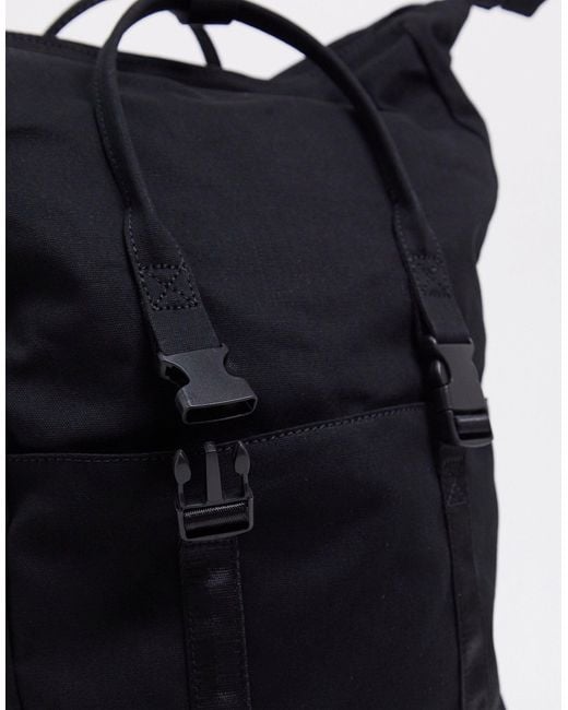 black backpack with laptop compartment
